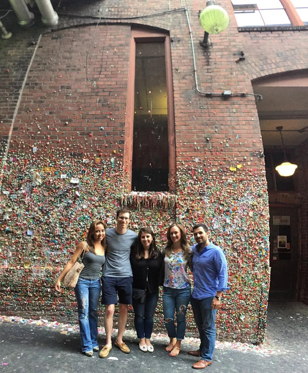 Dee and four friends in front of Seattle’s gum wall